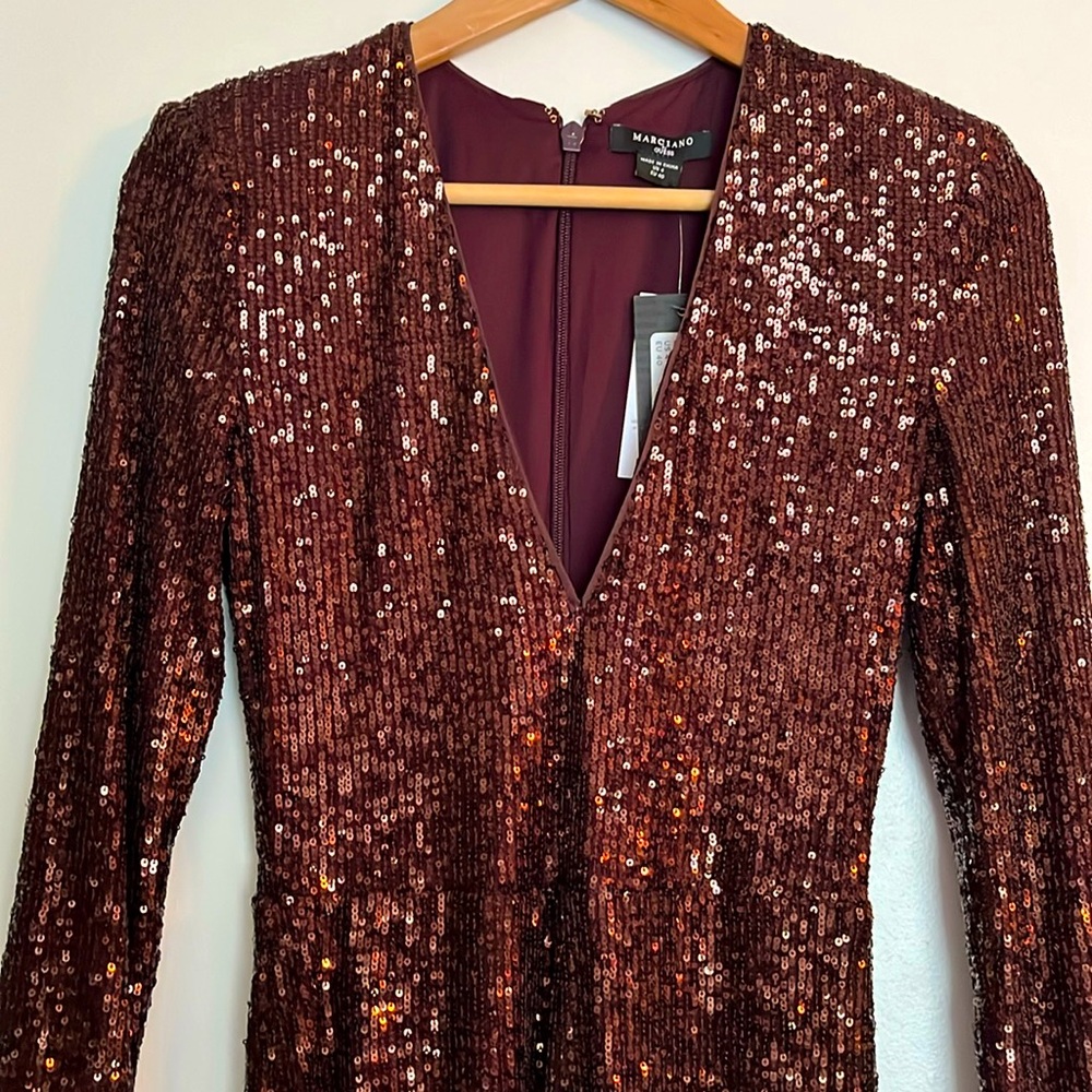 Marciano Chocolate brown sequence one piece, extremely fitted.